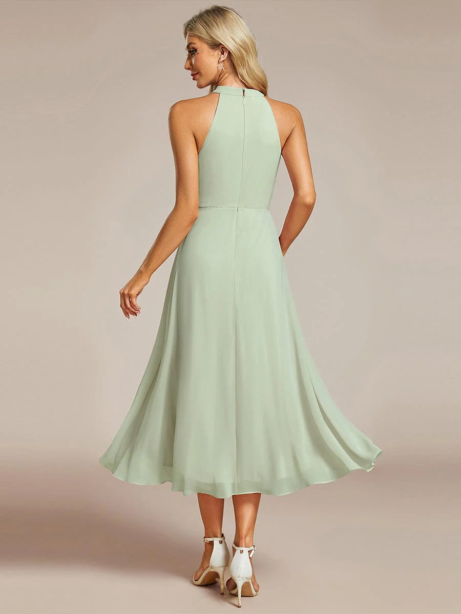 Seraphina | Pleated for Graceful Occasions – Halter Neck Midi Dress