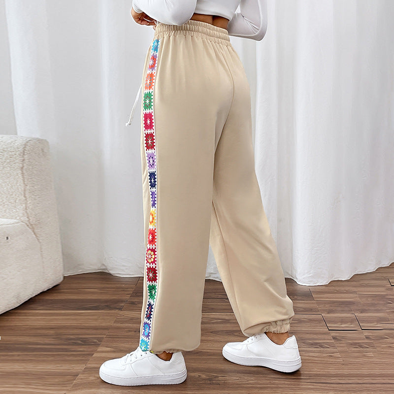 Feathorne Women's Marlowe Apricot Embroidered Sweatpants - detail view showing embroidery